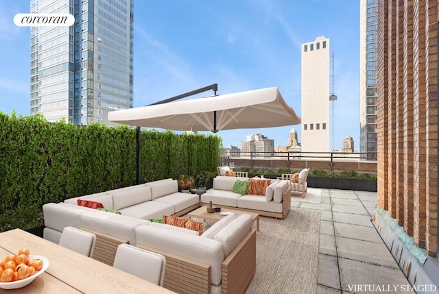 365 Bridge St Unit 19A, New York City, NY 11201 - view of patio with outdoor lounge area and a city view
