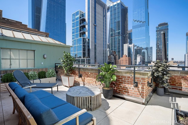 360 W 36th St Unit Ph12, New York City, NY 10018 - view of patio / terrace featuring a view of skyline