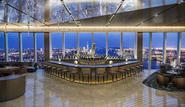 360 W 36th St Unit Ph12, New York City, NY 10018 - bar area featuring expansive windows