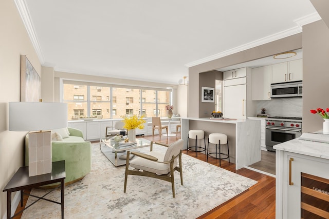 230 E 79th St Unit 12Cd, New York City, NY 10021 - living room with ornamental molding and wood finished floors