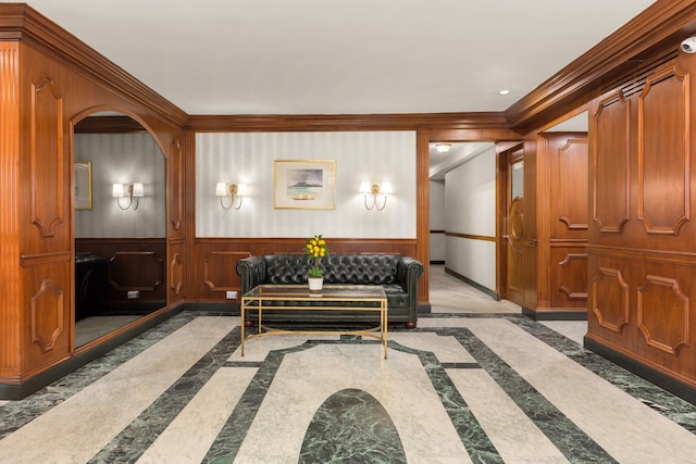 230 E 79th St Unit 12Cd, New York City, NY 10021 - building lobby with crown molding, a wainscoted wall, and wooden walls