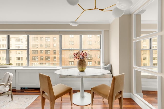 230 E 79th St Unit 12Cd, New York City, NY 10021 - dining room with crown molding and wood finished floors