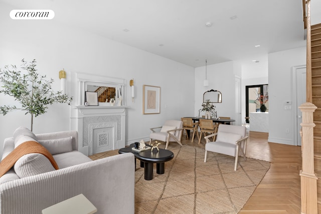 16 Goodwin Place, New York City, NY 11221 - living room with a fireplace and baseboards