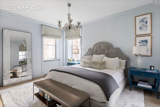 100 W 80th St Unit 5B, New York City, NY 10024 - bedroom featuring a chandelier, crown molding, and light wood-type flooring