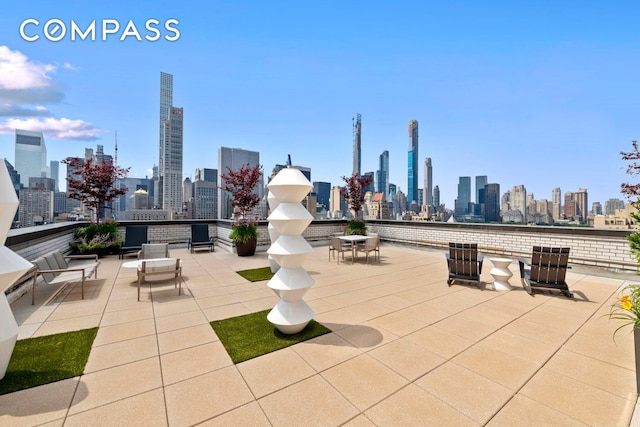 view of patio / terrace featuring a view of city