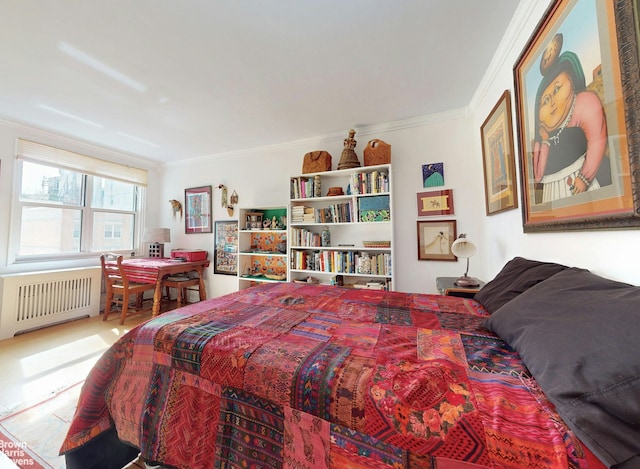 bedroom featuring radiator and ornamental molding