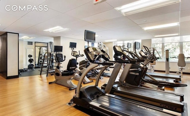 gym featuring wood finished floors