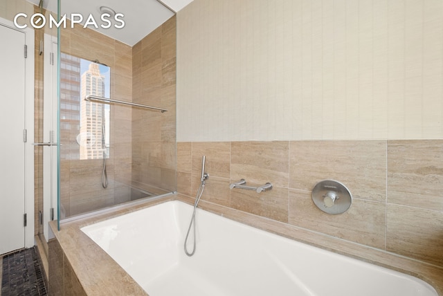 full bathroom featuring a tub