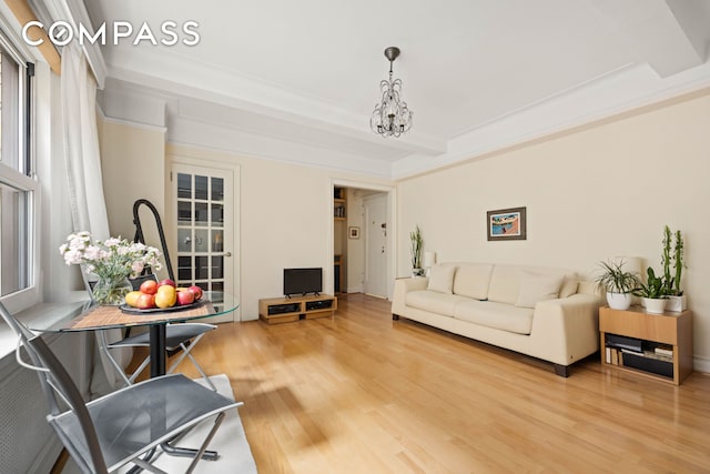 70 Remsen St Unit 4J, New York City, NY 11201 - living room with wood finished floors and a chandelier