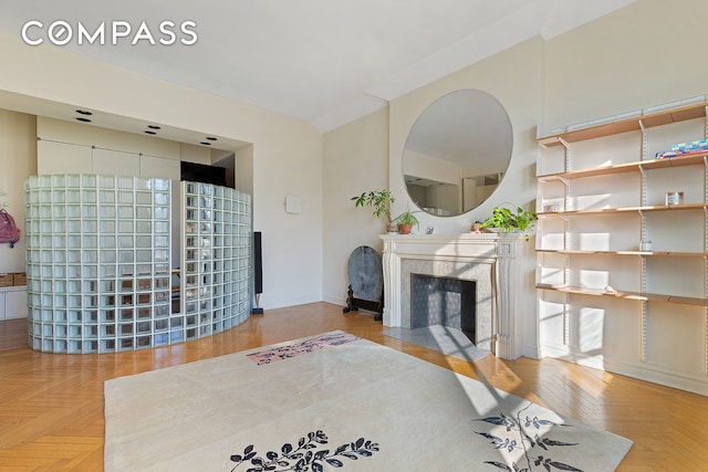 11 W 81st St Unit 6A, New York City, NY 10024 - living area with a premium fireplace and baseboards