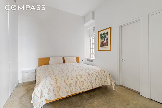 11 W 81st St Unit 6A, New York City, NY 10024 - bedroom with carpet, radiator heating unit, and baseboards