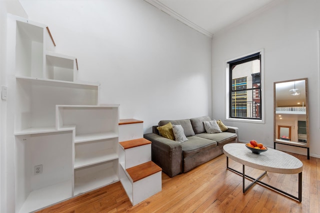 331 E 92nd St Unit 5C, New York City, NY 10128 - living room with ornamental molding and light wood-type flooring