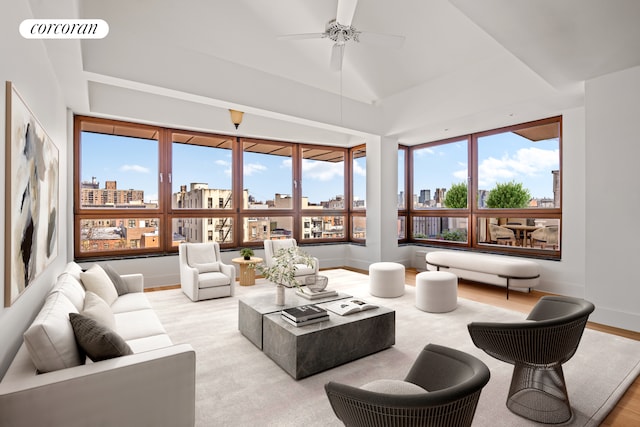 sunroom featuring a city view