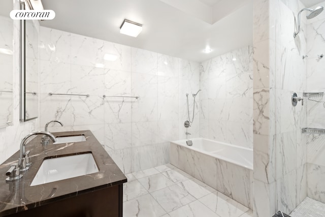 full bath featuring marble finish floors, double vanity, a combined bath / shower with marble appearance, and tile walls