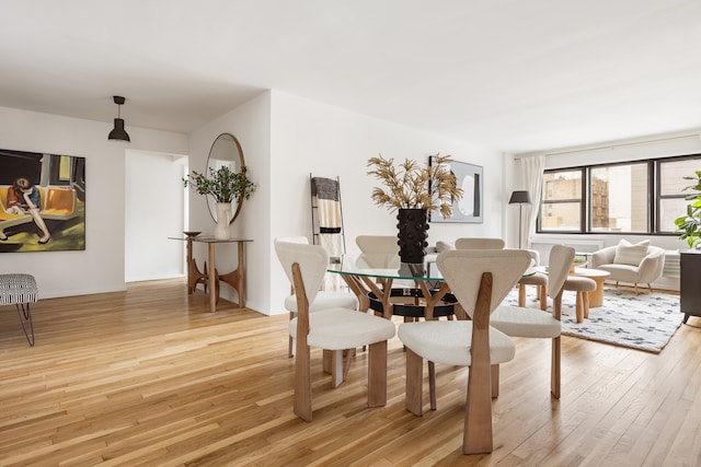 140 7th Ave Unit 4L, New York City, NY 10011 - dining area with light wood finished floors