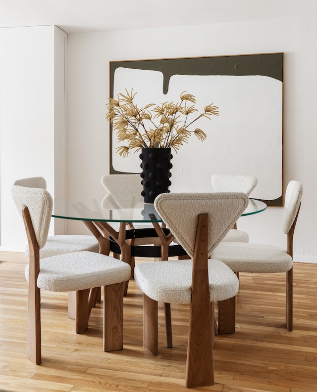 140 7th Ave Unit 4L, New York City, NY 10011 - dining space featuring breakfast area and wood finished floors