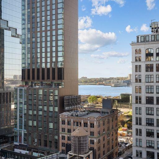 448 W 37th St Unit 9A, New York City, NY 10018 - city view with a nearby body of water