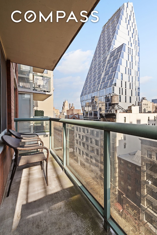 balcony featuring a city view