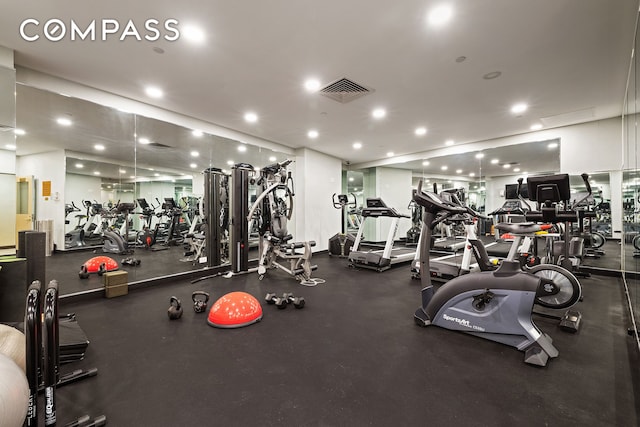 gym with recessed lighting