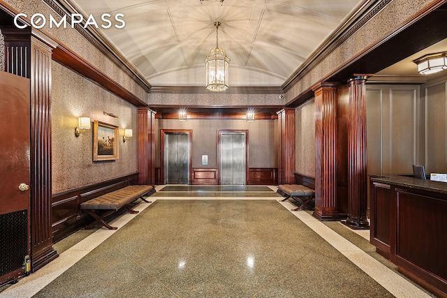 22 W 15th St Unit 10G, New York City, NY 10011 - building lobby with vaulted ceiling, a decorative wall, a wainscoted wall, and ornamental molding