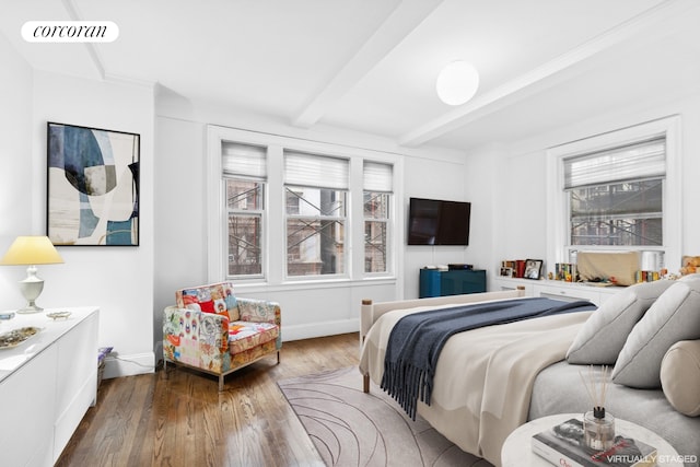 240 W 98th St Unit 3D, New York City, NY 10025 - bedroom featuring wood finished floors and beam ceiling
