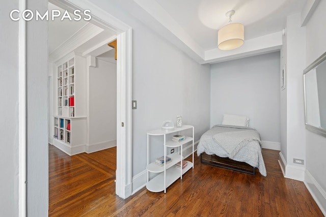 136 E 36th St Unit 9/10C, New York City, NY 10016 - bedroom featuring wood finished floors and baseboards