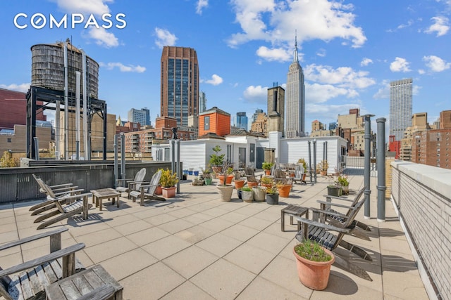 136 E 36th St Unit 9/10C, New York City, NY 10016 - view of patio with a view of skyline