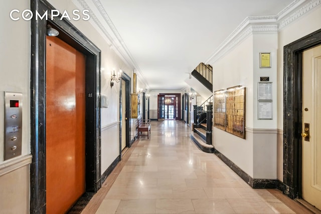 136 E 36th St Unit 9/10C, New York City, NY 10016 - hallway with crown molding, baseboards, and elevator