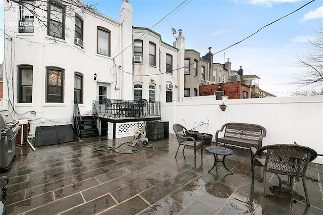 view of patio with fence