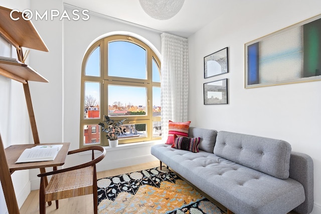 229 9th St Unit 601, New York City, NY 11215 - living area featuring wood finished floors and baseboards