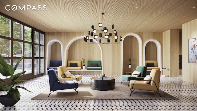 229 9th St Unit 601, New York City, NY 11215 - sitting room featuring wooden walls, a chandelier, wood ceiling, carpet floors, and expansive windows