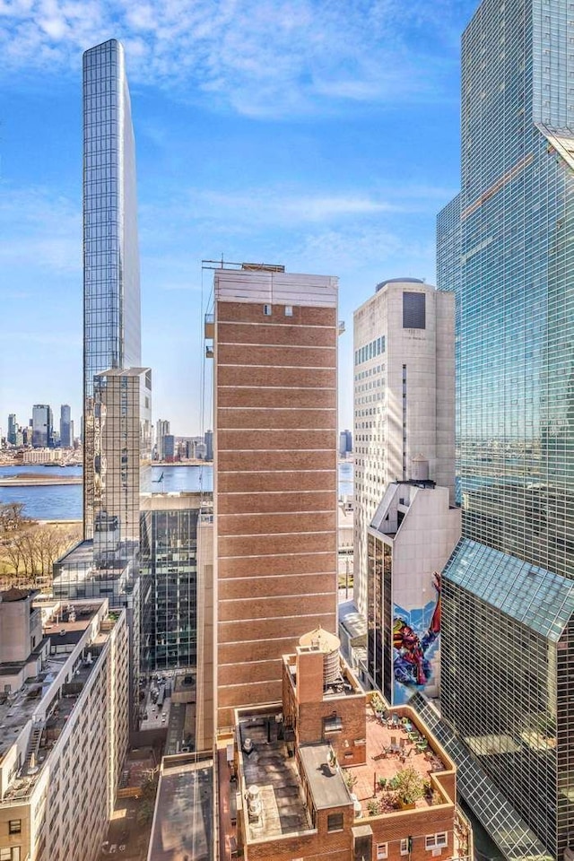 310 E 46th St Unit 19M, New York City, NY 10017 - view of city skyline featuring a large body of water
