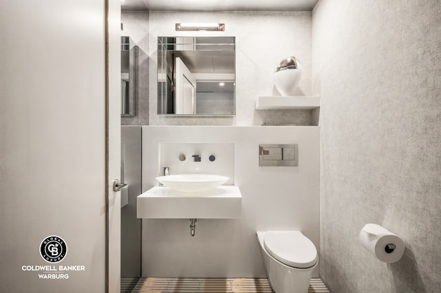 1355 1st Ave Unit 9Fl, New York City, NY 10021 - bathroom with a sink and toilet