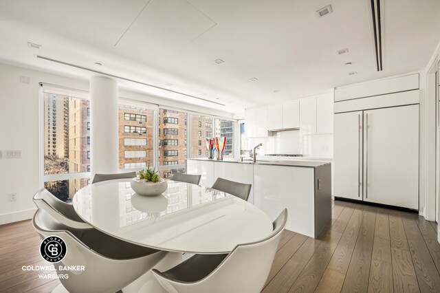1355 1st Ave Unit 9Fl, New York City, NY 10021 - dining space with hardwood / wood-style flooring