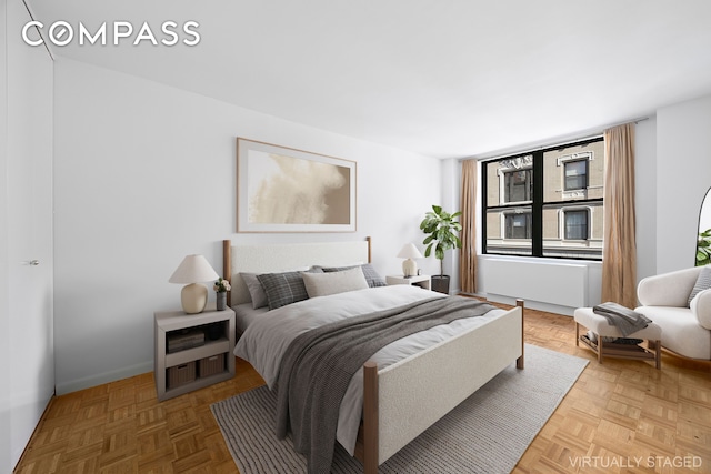 bedroom with baseboards