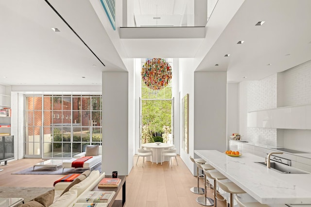 38-40 E 76th St, New York City, NY 10021 - living area featuring light wood-style flooring