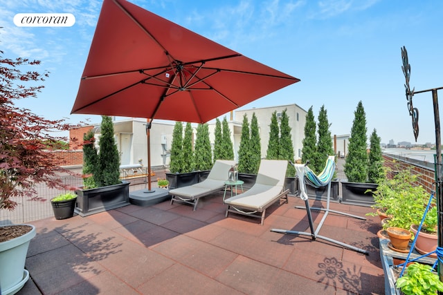 view of patio / terrace featuring fence