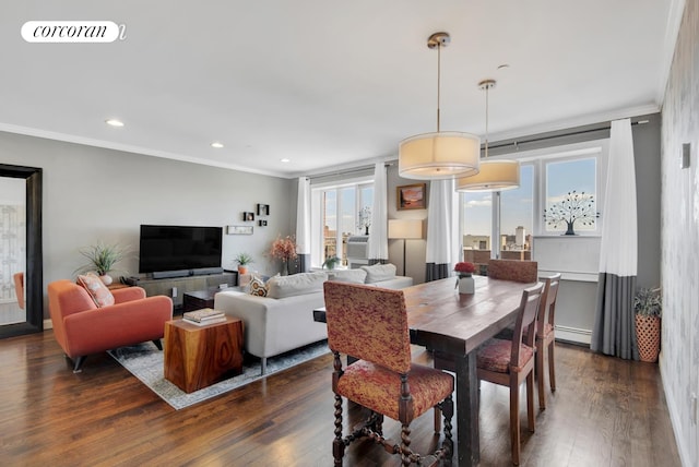 dining area featuring dark wood finished floors, visible vents, baseboard heating, and ornamental molding