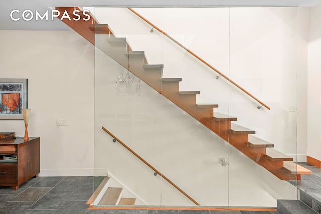staircase with baseboards