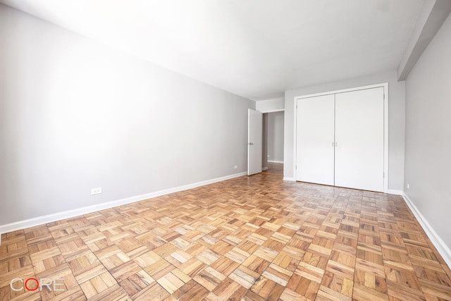 37-31 73rd St Unit 3P, New York City, NY 11372 - unfurnished bedroom featuring baseboards and a closet