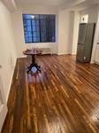 unfurnished living room featuring baseboards and wood finished floors