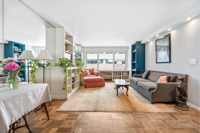 136 E 56th St Unit 8L, New York City, NY 10022 - living room with baseboards