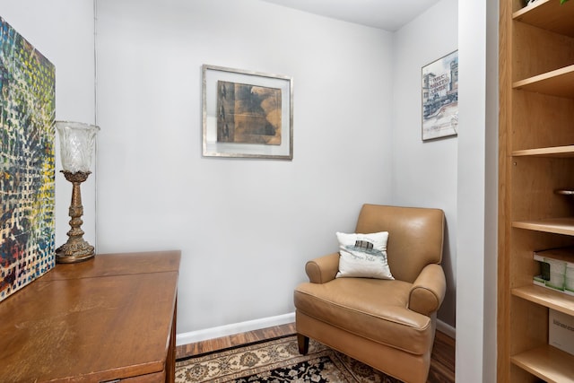 136 E 56th St Unit 8L, New York City, NY 10022 - living area featuring wood finished floors and baseboards