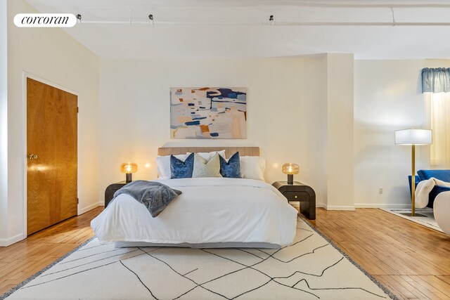 40 W 24th St Unit 6West, New York City, NY 10010 - bedroom featuring hardwood / wood-style floors and baseboards