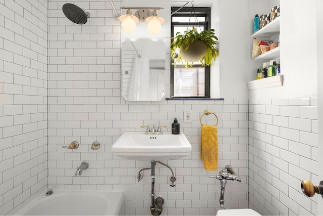 192 E 8th St Unit 6A, New York City, NY 11218 - bathroom with tile walls,  shower combination, a sink, and toilet