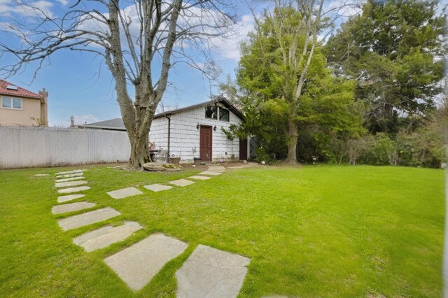 view of yard with fence
