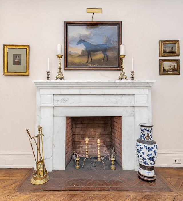 45 E 62nd St Unit 2B, New York City, NY 10065 - detailed view of a premium fireplace and baseboards
