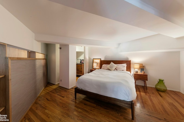77 Bleecker St Unit 520, New York City, NY 10012 - bedroom featuring wood finished floors and baseboards