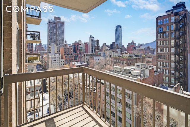 balcony featuring a city view