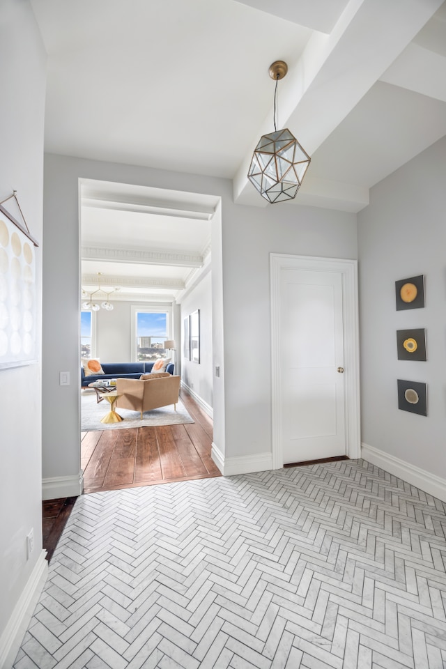 foyer entrance with baseboards